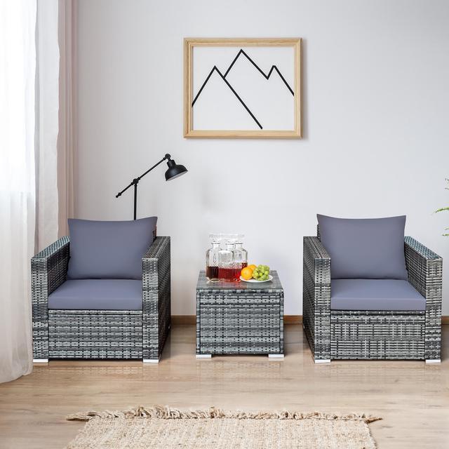 Alt view image 4 of 6 - Costway 3 PCS Patio Rattan Furniture Bistro Set Cushioned Sofa Chair Glass Table Garden