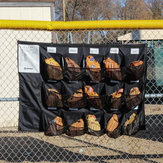 Alt view image 7 of 7 - Get Out! Hanging Baseball Helmet Bag - 15 Pocket Team Equipment Organizer