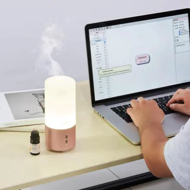 Alt view image 4 of 7 - Vivitar 100ML Essential Oil Diffuser, Quiet Premium Humidifier, Natural Home Fragrance Aroma Diffuser with 7 LED Color Changing Light - Regal Rose Gold