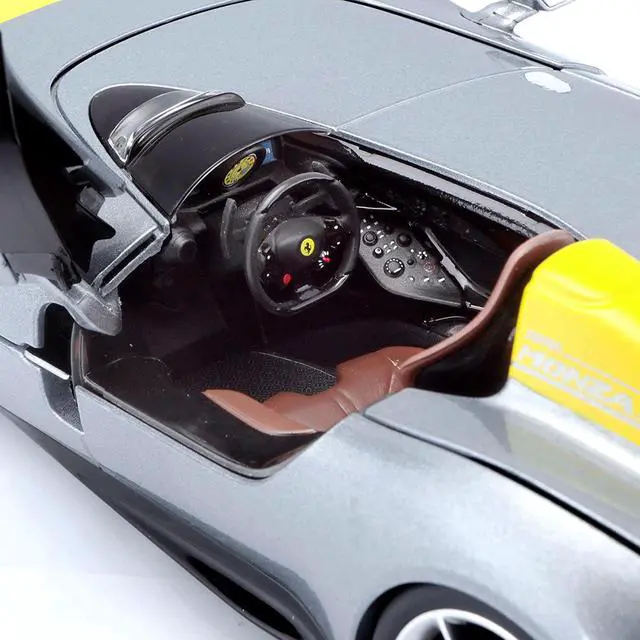 Alt view image 5 of 6 - Ferrari Monza SP1 Silver Metallic with Yellow Stripes 1/18 Diecast Model Car by Bburago