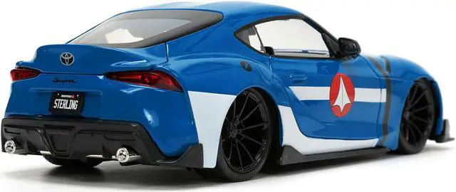 Alt view image 10 of 16 - 2020 Toyota Supra Blue with Graphics and Max Sterling Diecast Figurine "Robotech" "Hollywood Rides" Series 1/24 Diecast Model Car by Jada