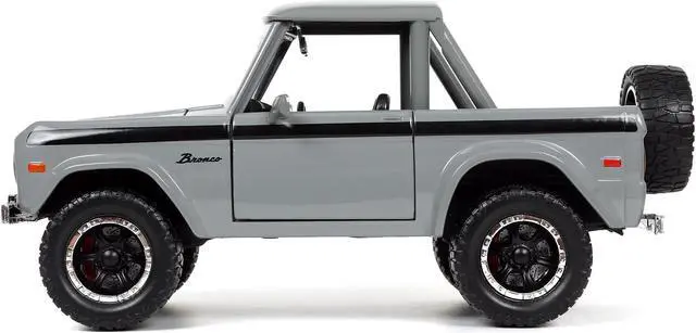 Alt view image 5 of 7 - 1973 Ford Bronco Pickup Truck Gray with Black Stripes with Extra Wheels "Just Trucks" Series 1/24 Diecast Model Car by Jada