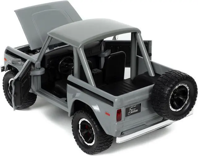 Alt view image 6 of 7 - 1973 Ford Bronco Pickup Truck Gray with Black Stripes with Extra Wheels "Just Trucks" Series 1/24 Diecast Model Car by Jada