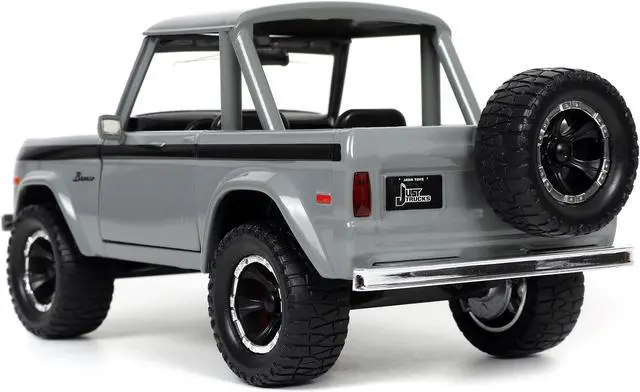 Alt view image 7 of 7 - 1973 Ford Bronco Pickup Truck Gray with Black Stripes with Extra Wheels "Just Trucks" Series 1/24 Diecast Model Car by Jada