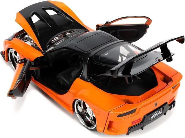 Alt view image 5 of 8 - 1995 Mazda RX-7 Widebody RHD (Right Hand Drive) Orange Metallic and Black with Han Diecast Figurine "The Fast and the Furious: Tokyo Drift" (2006) Movie 1/24 Diecast Model Car by Jada