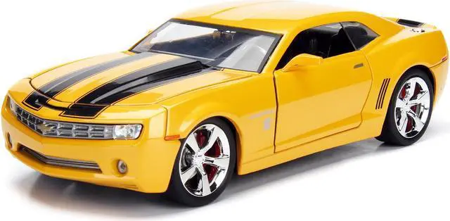 Alt view image 4 of 8 - 2006 Chevrolet Camaro Concept Yellow Bumblebee with Robot on Chassis and Collectible Metal Coin "Transformers" Movie 1/24 Diecast Model Car by Jada