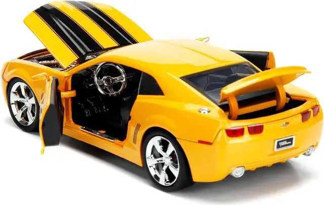 Alt view image 7 of 8 - 2006 Chevrolet Camaro Concept Yellow Bumblebee with Robot on Chassis and Collectible Metal Coin "Transformers" Movie 1/24 Diecast Model Car by Jada