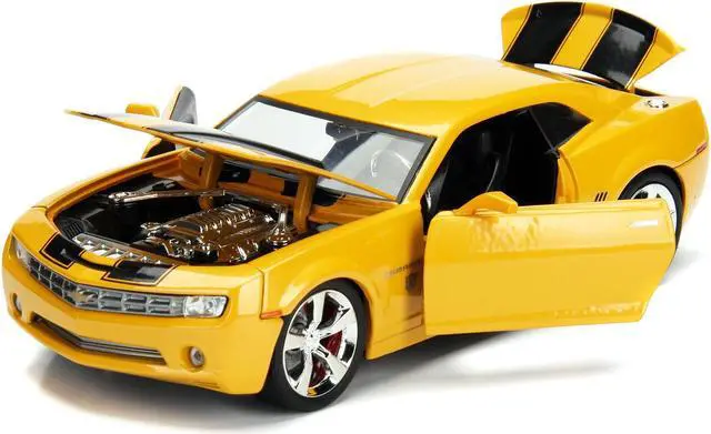 Alt view image 5 of 8 - 2006 Chevrolet Camaro Concept Yellow Bumblebee with Robot on Chassis and Collectible Metal Coin "Transformers" Movie 1/24 Diecast Model Car by Jada