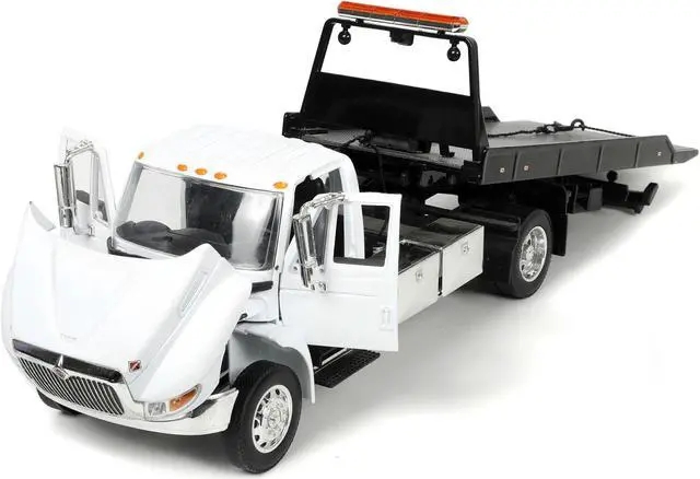 Alt view image 4 of 8 - International DuraStar 4400 Flatbed Tow Truck White 1/24 Diecast Model by Jada