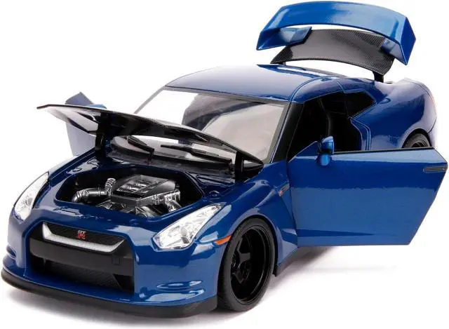 Alt view image 4 of 8 - 2009 Nissan GT-R (R35) Blue Metallic and Carbon with Lights and Brian Figurine "Fast & Furious" Movie 1/18 Diecast Model Car by Jada