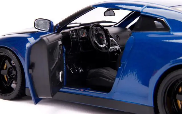 Alt view image 5 of 8 - 2009 Nissan GT-R (R35) Blue Metallic and Carbon with Lights and Brian Figurine "Fast & Furious" Movie 1/18 Diecast Model Car by Jada