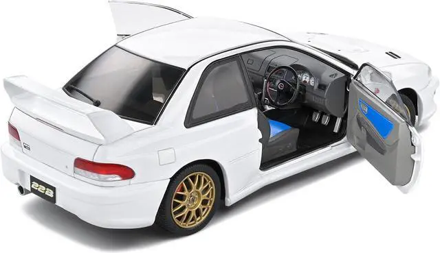 Alt view image 4 of 5 - 1998 Subaru Impreza 22B RHD (Right Hand Drive) Pure White with Gold Wheels 1/18 Diecast Model Car by Solido