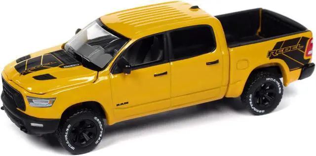 Alt view image 2 of 3 - 2023 Ram 1500 Rebel Havoc Edition Pickup Truck Baja Yellow "Muscle Trucks" Series 1/64 Diecast Model Car by Auto World