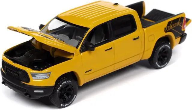 Alt view image 3 of 3 - 2023 Ram 1500 Rebel Havoc Edition Pickup Truck Baja Yellow "Muscle Trucks" Series 1/64 Diecast Model Car by Auto World