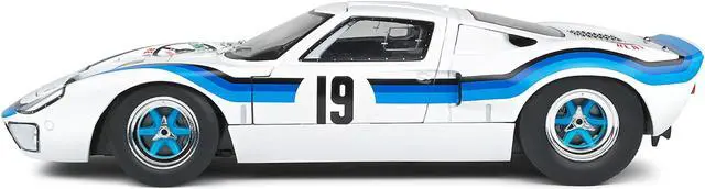 Alt view image 4 of 6 - Ford GT40 MK.1 RHD #19 Emilio Marta "Angola Championship" (1973) "Competition" Series 1/18 Diecast Model Car by Solido