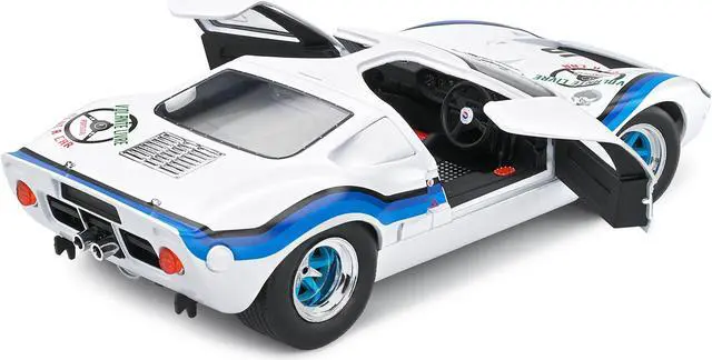Alt view image 5 of 6 - Ford GT40 MK.1 RHD #19 Emilio Marta "Angola Championship" (1973) "Competition" Series 1/18 Diecast Model Car by Solido