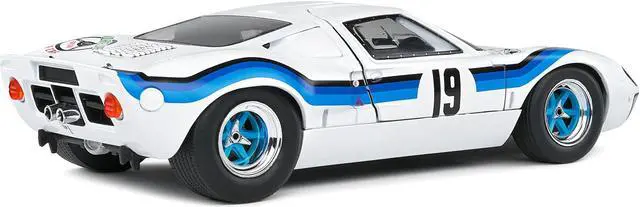 Alt view image 6 of 6 - Ford GT40 MK.1 RHD #19 Emilio Marta "Angola Championship" (1973) "Competition" Series 1/18 Diecast Model Car by Solido