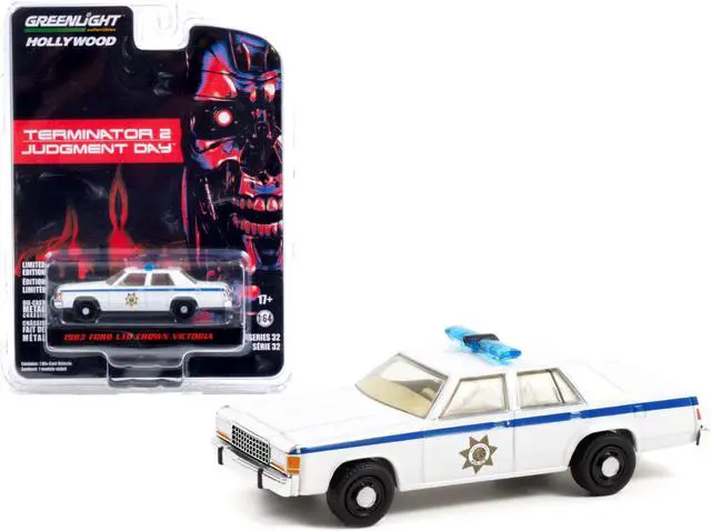 Main image of 1983 Ford LTD Crown Victoria Police White "Terminator 2: Judgment Day" Movie "Hollywood Series" 1/64 Diecast Car by Greenlight