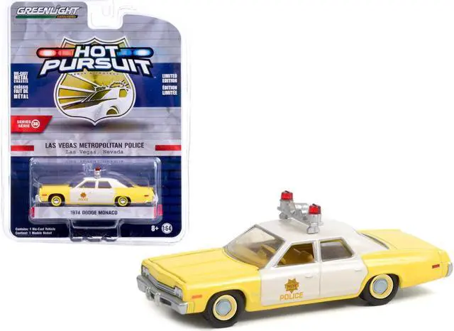 Main image of 1974 Dodge Monaco Yellow & White "Las Vegas Metropolitan Police Dept." (Nevada) Hot Pursuit 1/64 Diecast Model Car by Greenlight