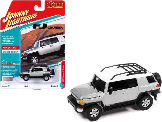 Main image of 2007 Toyota FJ Cruiser Titanium Silver Metallic with White Top and Roofrack LTd Ed 1/64 Diecast Model Car by Johnny Lightning