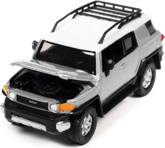 Alt view image 3 of 3 - 2007 Toyota FJ Cruiser Titanium Silver Metallic with White Top and Roofrack LTd Ed 1/64 Diecast Model Car by Johnny Lightning