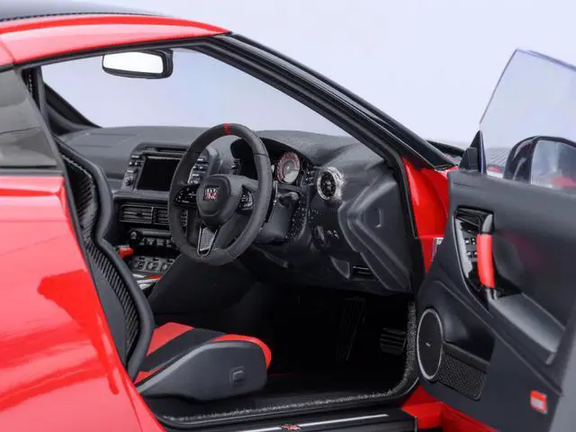 Alt view image 3 of 6 - 2022 Nissan GT-R (R35) Nismo Special Edition RHD Vibrant Red with Carbon Hood and Top 1/18 Model Car by Autoart