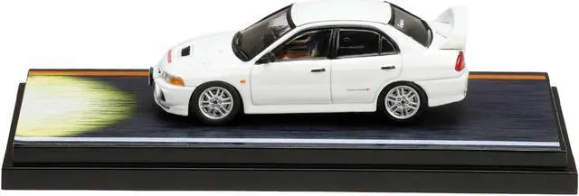 Alt view image 2 of 3 - Mitsubishi Lancer RS Evolution IV White "Monstar" w/Figure "Initial D" (1995-2013) Manga 1/64 Diecast Model Car by Hobby Japan