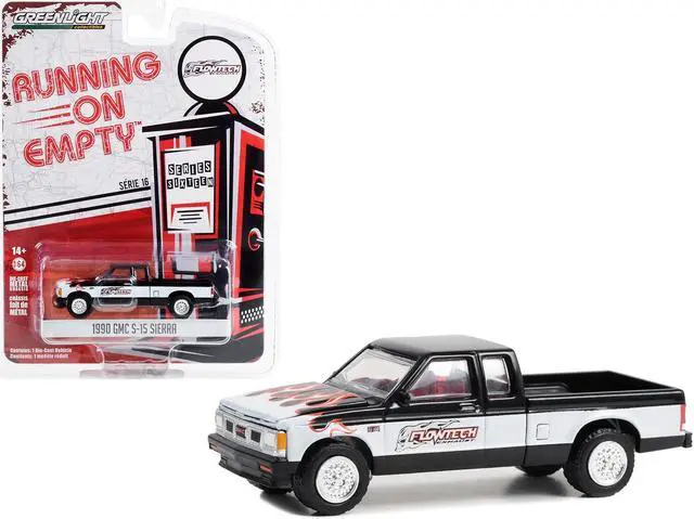 Main image of 1990 GMC S-15 Sierra Pickup Truck Black and White with Flames "Flowtech Exhaust" 1/64 Diecast Model Car by Greenlight