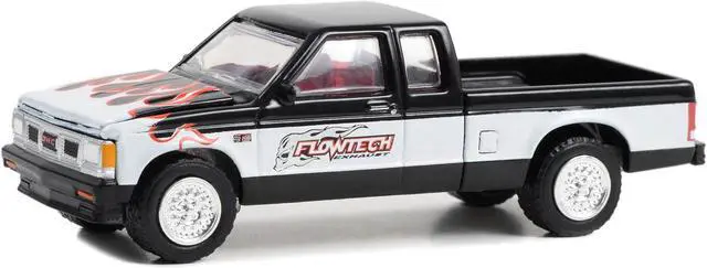 Alt view image 2 of 3 - 1990 GMC S-15 Sierra Pickup Truck Black and White with Flames "Flowtech Exhaust" 1/64 Diecast Model Car by Greenlight
