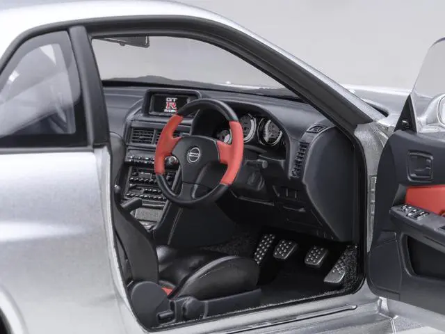 Alt view image 4 of 6 - Nissan Nismo R34 GT-R Z-TUNE RHD (Right Hand Drive) Silver Metallic 1/18 Model Car by Autoart