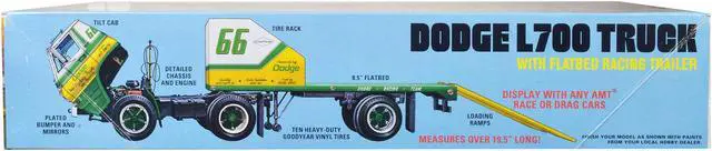 Alt view image 2 of 4 - Skill 3 Model Kit 1966 Dodge L700 Truck with Flatbed Racing Trailer 1/25 Scale Model by AMT