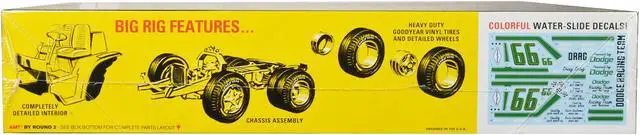 Alt view image 3 of 4 - Skill 3 Model Kit 1966 Dodge L700 Truck with Flatbed Racing Trailer 1/25 Scale Model by AMT