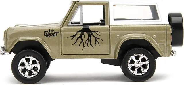 Alt view image 3 of 11 - 1973 Ford Bronco Gold Met. w/White Top & Groot Figure "Guardians of the Galaxy" "Marvel" Series 1/32 Diecast Model Car by Jada