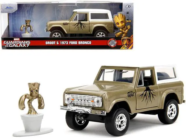 Main image of 1973 Ford Bronco Gold Met. w/White Top & Groot Figure "Guardians of the Galaxy" "Marvel" Series 1/32 Diecast Model Car by Jada