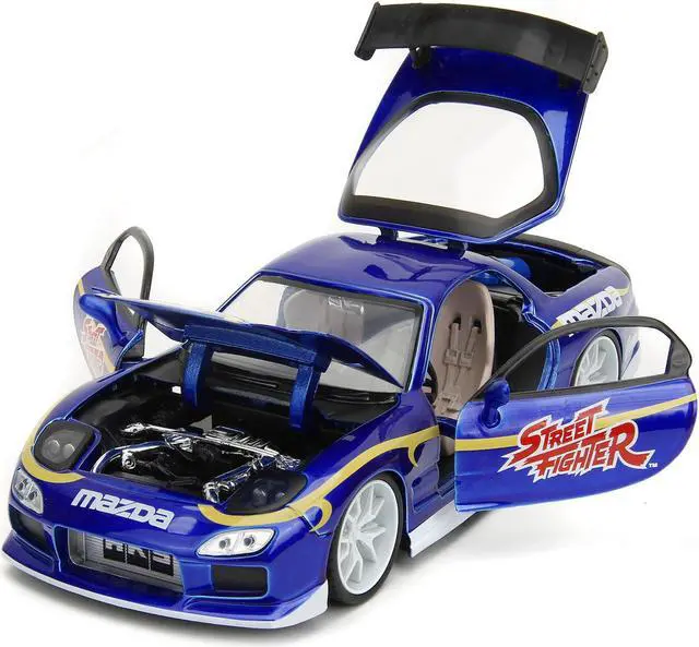 Alt view image 2 of 6 - 1993 Mazda RX-7 Candy Blue Met. w/Graphics and Chun-Li Diecast Figure "Street Fighter" Video Game 1/24 Diecast Model Car by Jada