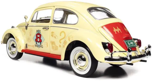 Alt view image 6 of 6 - Auto World 1963 Volkswagen Beetle Yukon Yellow Monopoly Free Parking 1/18 Scale Diecast Model Car with Mr. Monopoly Figure
