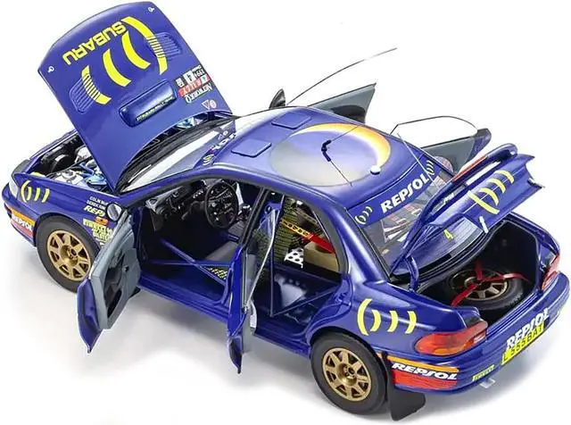 Alt view image 2 of 5 - Subaru Impreza #4 Colin McRae - Derek Ringer Winner "RAC Rally" (1994) 1/18 Diecast Model Car by Kyosho