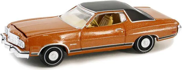Alt view image 3 of 3 - 1973 Ford Gran Torino Copper Metallic with Black Vinyl Top "Vintage Ad Cars" Series 10 1/64 Diecast Model Car by Greenlight