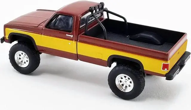 Alt view image 4 of 6 - 1986 Chevrolet K-20 Pickup Truck Brown Met. w/Gold Stripes Stacey David's Fall Guy 1/64 Diecast Model Car by Greenlight for ACME