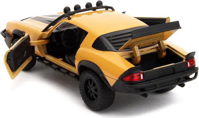 Alt view image 4 of 6 - 1977 Chevrolet Camaro Off-Road Version Yellow Met. w/Black Stripes & Statue "Transformers" (2023) 1/24 Diecast Model Car by Jada