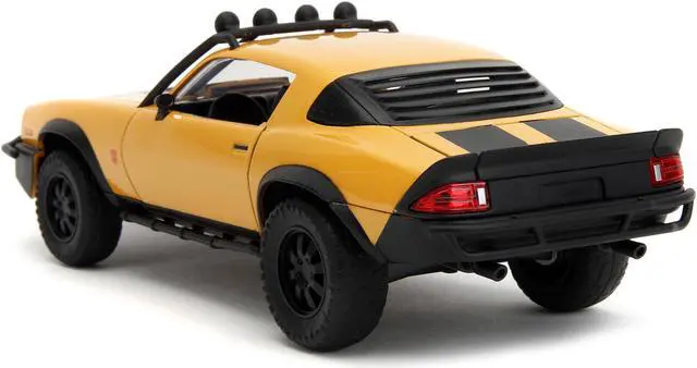 Alt view image 5 of 6 - 1977 Chevrolet Camaro Off-Road Version Yellow Met. w/Black Stripes & Statue "Transformers" (2023) 1/24 Diecast Model Car by Jada