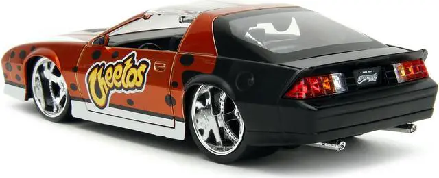 Alt view image 6 of 11 - 1985 Chevrolet Camaro Z/28 Orange Metallic w/Graphics & Chester Cheetah Diecast Figure "Cheetos" 1/24 Diecast Model Car by Jada