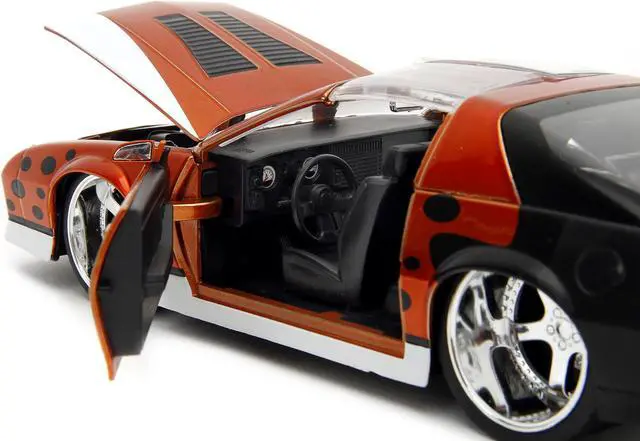 Alt view image 3 of 11 - 1985 Chevrolet Camaro Z/28 Orange Metallic w/Graphics & Chester Cheetah Diecast Figure "Cheetos" 1/24 Diecast Model Car by Jada