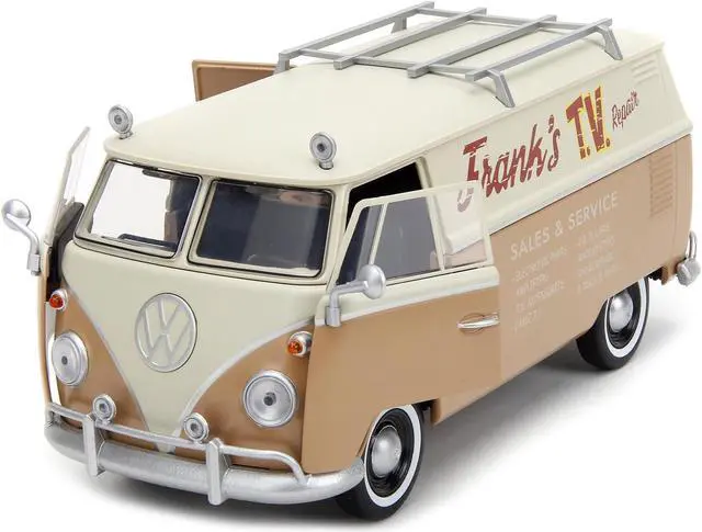 Alt view image 2 of 6 - Volkswagen Bus "WheelJack" Tan & Beige "Frank's TV Repair" & Logo Statue Transformers 2023 Movie 1/24 Diecast Model Car by Jada