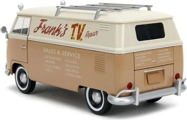 Alt view image 6 of 6 - Volkswagen Bus "WheelJack" Tan & Beige "Frank's TV Repair" & Logo Statue Transformers 2023 Movie 1/24 Diecast Model Car by Jada
