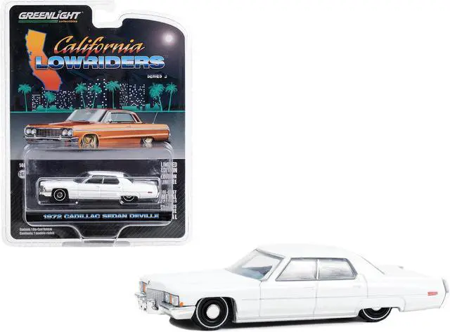 Main image of 1972 Cadillac Sedan deVille Lowrider Cotillion White with Blue Interior 1/64 Diecast Model Car by Greenlight