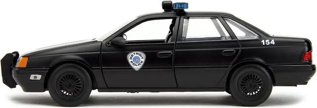 Alt view image 3 of 11 - Ford Taurus OCP Matt Black "Detroit Police" and Robocop Figure "Robocop" (1987) Movie 1/24 Diecast Model Car by Jada
