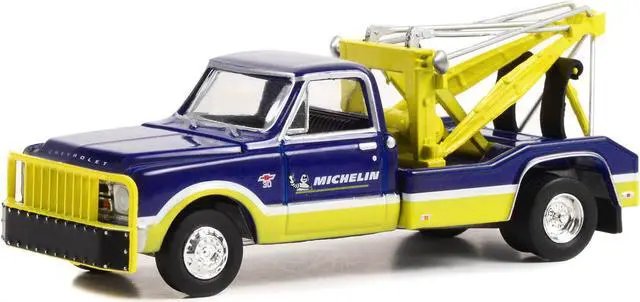 Alt view image 2 of 3 - 1967 Chevrolet C-30 Dually Wrecker Tow Truck "Michelin Service Center" Blue and Yellow 1/64 Diecast Model Car by Greenlight