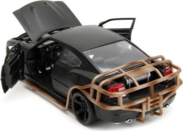 Alt view image 4 of 6 - 2006 Dodge Charger Matt Black with Outer Cage "Fast & Furious" Movie 1/24 Diecast Model Car by Jada