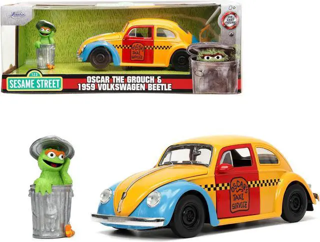 Main image of 1959 Volkswagen Beetle Taxi Yellow and Blue and Oscar the Grouch Diecast Figure "Sesame Street" 1/24 Diecast Model Car by Jada